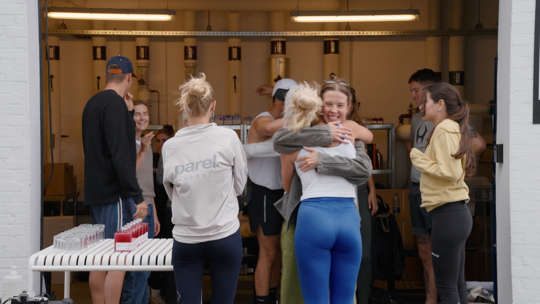 Dia greeting collaborators at the Aeris production space